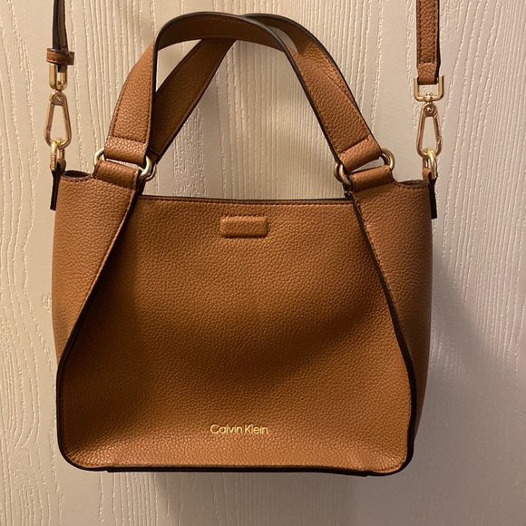 Calvin Klein Handbags - Calvin Klein tan purse and wallet set